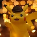 A close-up of a Pikachu figurine illuminated by a warm bokeh effect, creating an eye-catching visual.